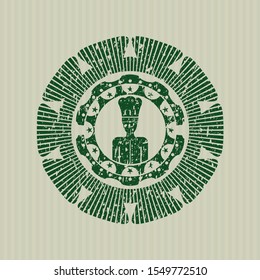 Green chef icon inside grunge stamp