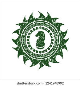 Green chess knight icon inside rubber grunge texture stamp