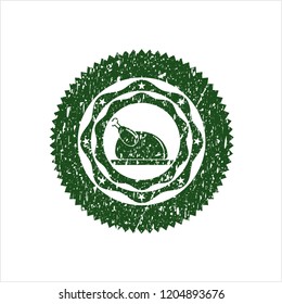 Green chicken dish icon inside distress rubber seal