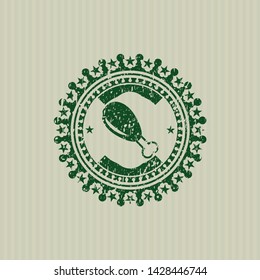 Green chicken leg icon inside rubber stamp
