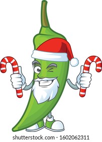 Green chili Cartoon character in Santa Claus with candy