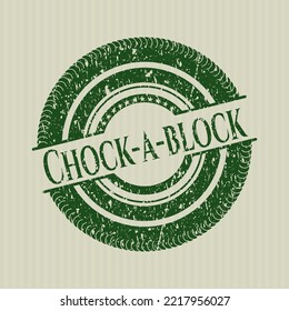 Green Chock-a-block distress rubber stamp. 