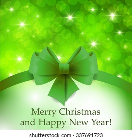 Green Christmas background with bow and ribbon