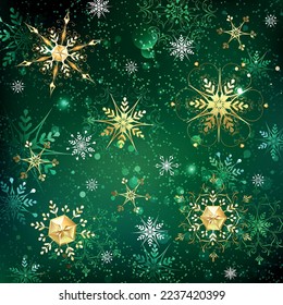 Green Christmas background with gold and green jewelry snowflakes. Golden snowflakes. Xmas.