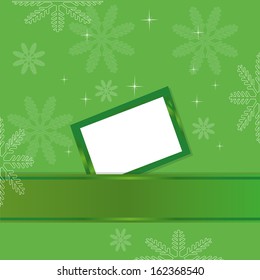 green Christmas background with greeting card 