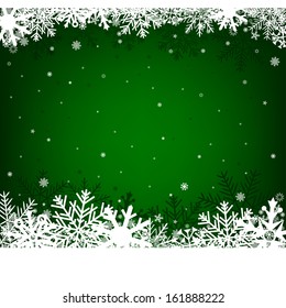 Green Christmas background on a winter theme with a beautiful white snow