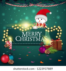 Green Christmas card with snowman, gifts and antique lamp