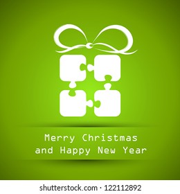 green christmas frame with puzzle gift. christmas card.