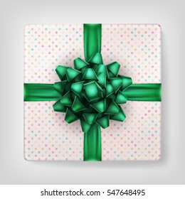 Green Christmas present on gray with shadow top view. EPS 10 vector file included