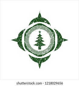 Green christmas tree icon inside distressed grunge seal