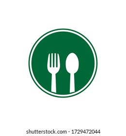green circle and fork spoon. for a restaurant icon or symbol.natural food