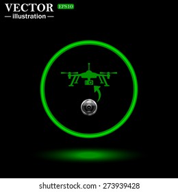 Green circle on a black background with illumination. Quadrocopter. icon. vector design