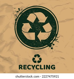 Green circle symbol wwith recycling symbol and ink blots. Paper background with text and recycle sign