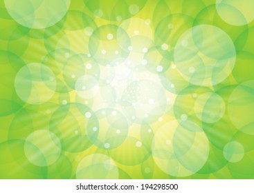 Green circles on white rays of light and bluish background.