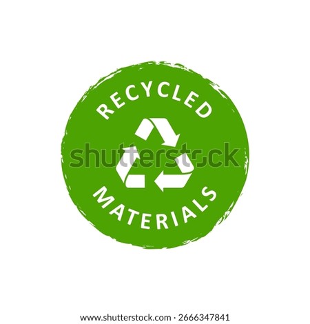 A green circular badge with a rough edge featuring a recycling symbol and the text recycled materials