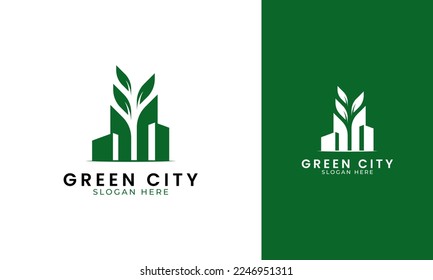 Green city logo design. Building with leaf icon for nature real estate concept