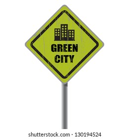 Green city road sign with condominium.