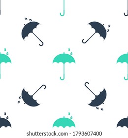 Clásico Verde elegante icono del paraguas abierto aislado patrón sin fisuras sobre fondo blanco. Símbolo de protección contra la lluvia. Vector.