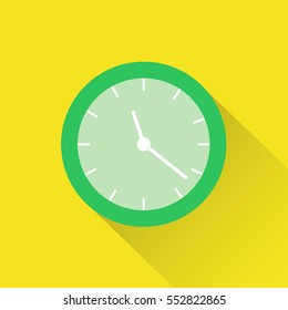 Green clock with shadow. Flat design