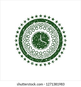 Green clock, time icon inside distress rubber seal with grunge texture