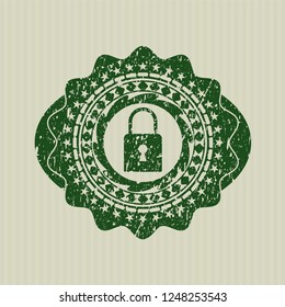 Green closed lock icon inside rubber grunge stamp