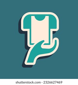 Green Clothes donation icon isolated on green background. Long shadow style. Vector