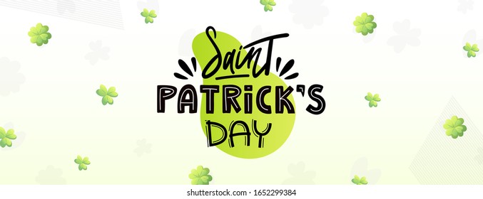Green clover and greeting lettering text on white. Saint Patrick's Day vector holiday banner design.