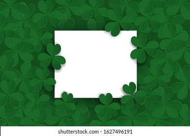 Green clover leaf frame in paper cut and St. Patrick's Day background