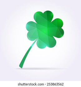 Green clover leaf in low poly style. Vector shamrock illustration