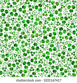 Green clover leaves mosaic texture isolated on white background. Happy St. Patrick's Day shamrock wallpaper. Seamless pattern. Abstract geometric shapes gradient vector illustration
