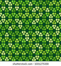 Green clover leaves mosaic texture isolated on dark background. Happy St. Patrick's Day shamrock wallpaper. Seamless pattern. Abstract geometric shapes gradient vector illustration