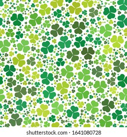 Green clover leaves mosaic texture isolated on white background. Happy St. Patrick's Day shamrock wallpaper. Seamless pattern. Abstract geometric shapes gradient vector illustration
