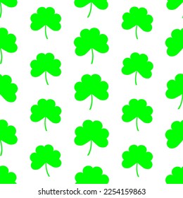 Green clover leaves on white background. Floral seamless pattern. Best for textile, wallpapers, wrapping paper, package, home decor and St Patrick's day decoration.