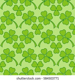 Green clover leaves seamless pattern. Irish St. Patrick's day vector background.
