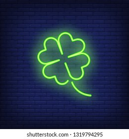 Green clover neon sign. Saint Patricks Day design. Night bright neon sign, colorful billboard, light banner. Vector illustration in neon style.