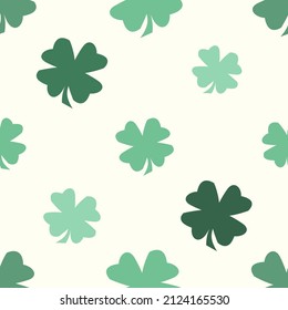 Green clover on yellow background textured seamless pattern for wrap gift box , Pattern for tablecloth, duvet cover, blanket, or other textile print.