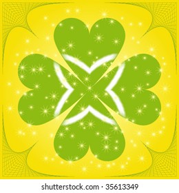 Green clover on yellow background with sparks