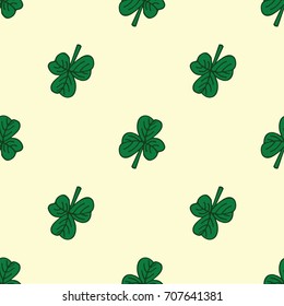 Green clover pattern on beige. St. Patrick day.