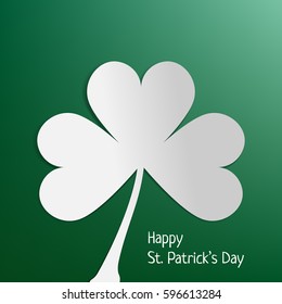 Green clover the symbol of St. Patrick's day on dark green background. Irish shamrock leaves poster for Happy St. Patrick's Day. 