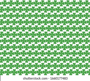 Green clover texture, white background. Shamrock.