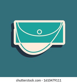 Green Clutch bag icon isolated on blue background. Women clutch purse. Long shadow style. Vector Illustration
