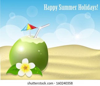 Green coconut with straw and cocktail umbrella stands on the sand on a background of blue sky 