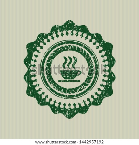 Green coffee cup icon inside distressed rubber grunge seal