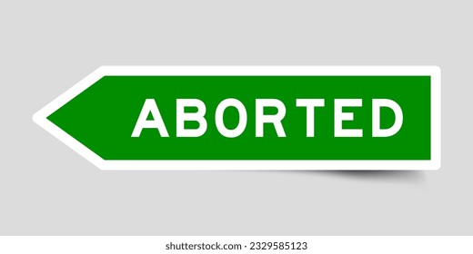 Green color arrow shape sticker label with word aborted on gray background