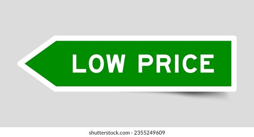 Green color arrow shape sticker label with word low priceon gray background