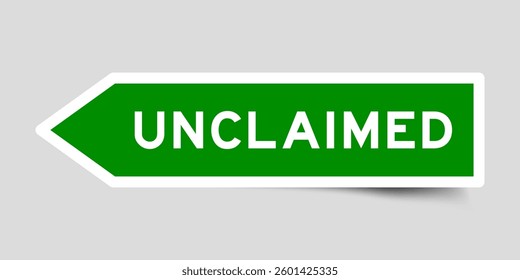 Green color arrow shape sticker label with word unclaimed on gray background