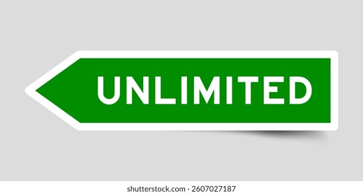 Green color arrow shape sticker label with word unlimited on gray background