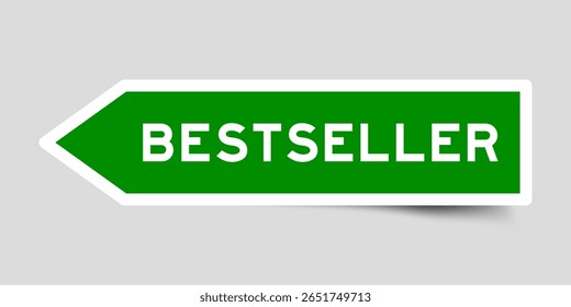Etiqueta adesiva de forma de seta de cor verde com palavra best seller no fundo cinza