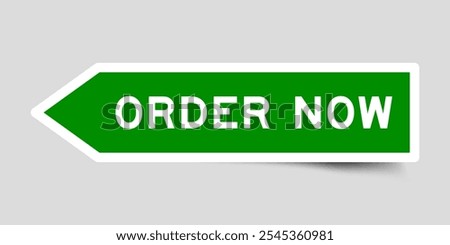 Green color arrow shape sticker label with word order now on gray background
