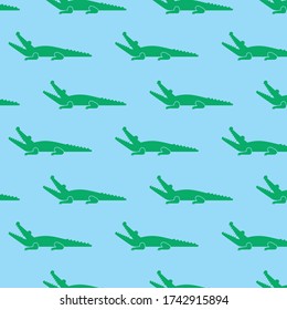 patrones de cocodrilo de color verde en el vector de fondo azul 